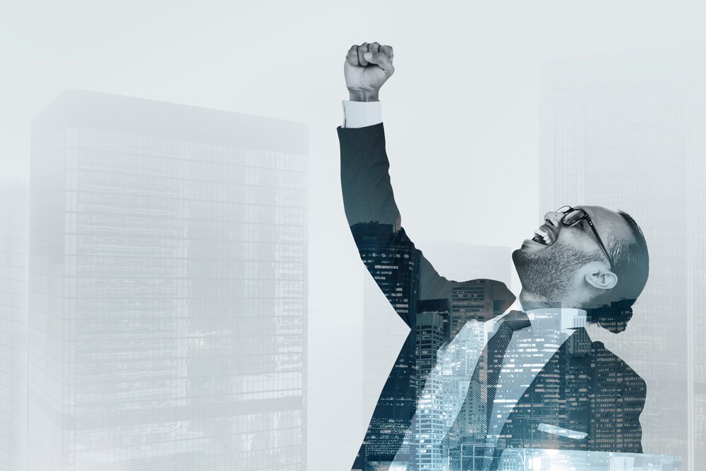 happy-successful-businessman_53876-89038